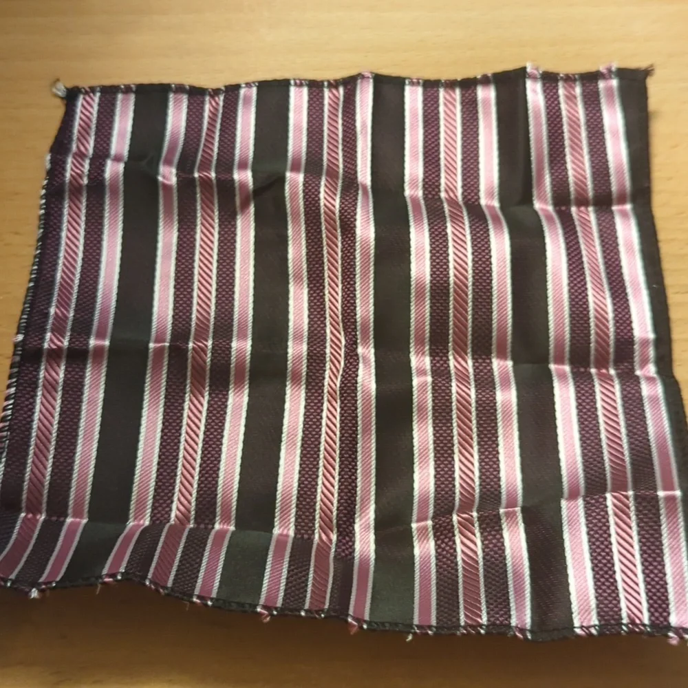 Cuff links with pocket square in a box